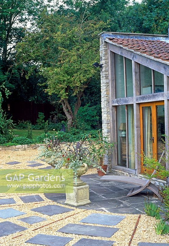 Edge of conservatory with gravel and paving - Saltford Farm, Bath, UK