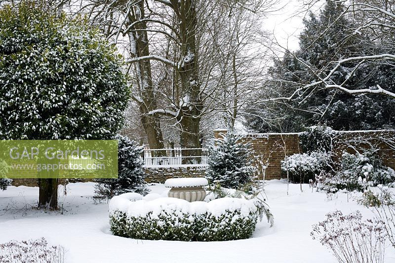 The Physic garden at Chenies Manor gardens covered in snow