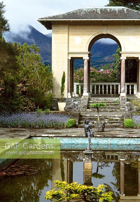The Italian garden with a view through to mountains beyond