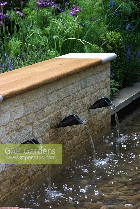 Water feature with seating The QVC Garden, sponsored by QVC - Silver Flora medal winner at RHS Chelsea Flower Show 2009