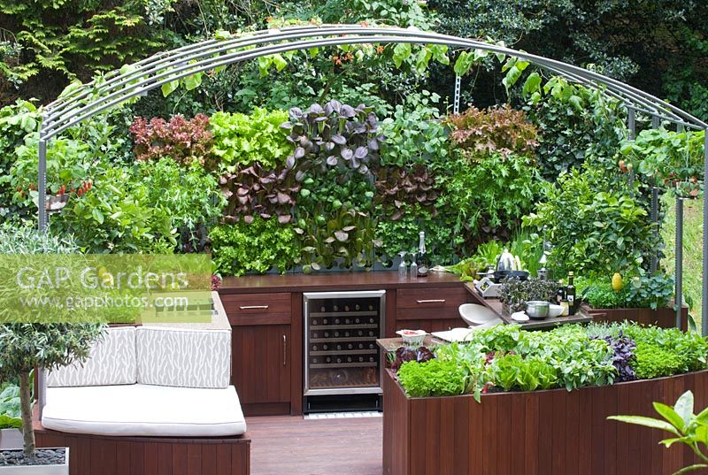 Outdoor kitchen and entertaining area with edible living wall planted with baby salad leaves - Freshly Prepped by Aralia, sponsored by Pawley and Malyon, Heather Barnes, Attwater and Liell - Silver Flora medal winner for Courtyard Garden at RHS Chelsea Flower Show 2009