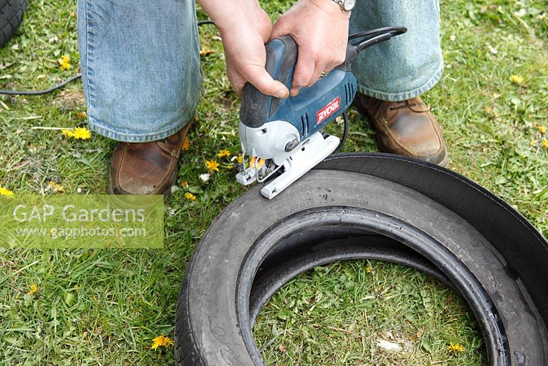 Making a tyre garden - Use a jigsaw with a coarse blade to cut out the rim