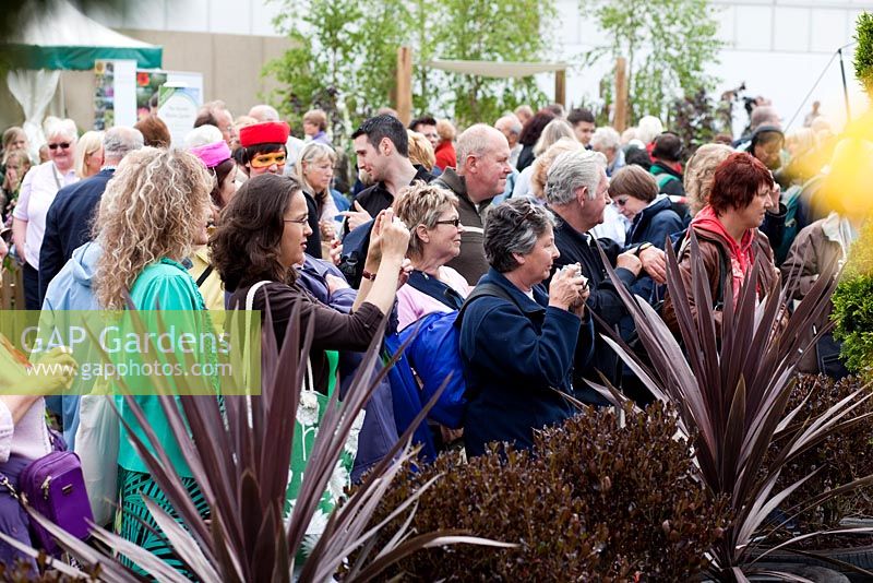 Crowds taking photographs of filming at the Baby Bio Garden at Gardeners' World Live, 2009 - Protecting Tomorrow Today