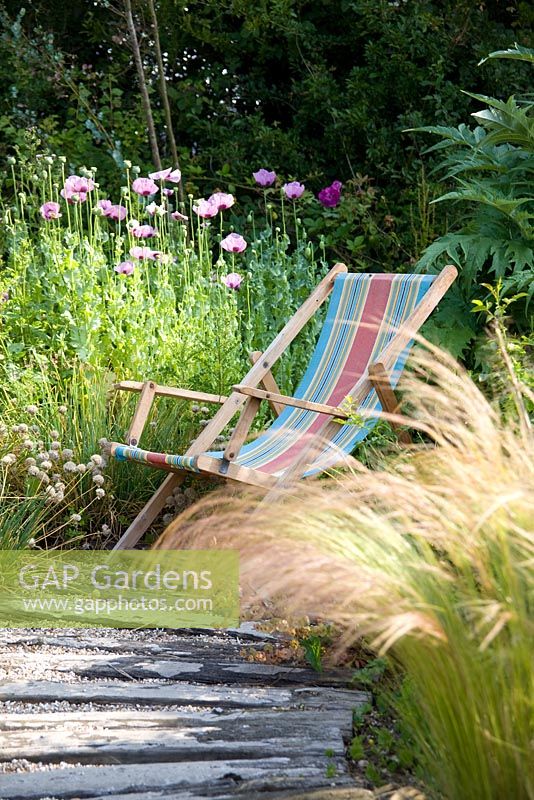 Deck chair in coastal-look garden