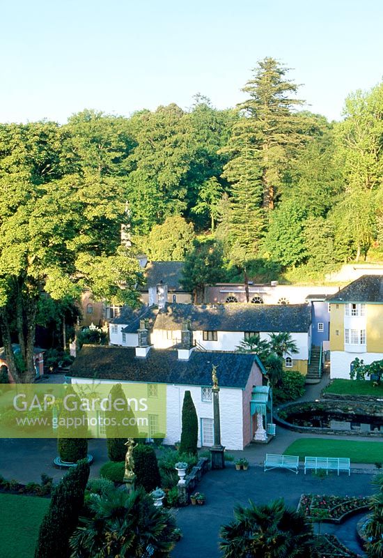 The Village - View down on to the Piazza. Topiarised Yew Colums. Main building in view - The Mermaid. Portmeirion, Gwynedd, Wales