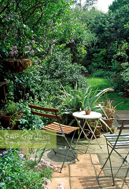 Garden view with patio, table and chairs