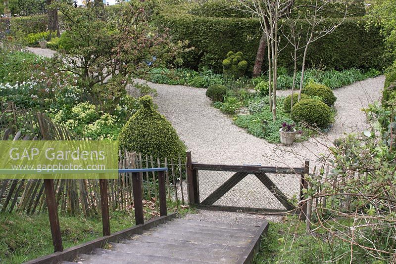 Steps leading to garden in Spring. The teagarden is a combination of model garden, garden shop and tearoom in Weesp