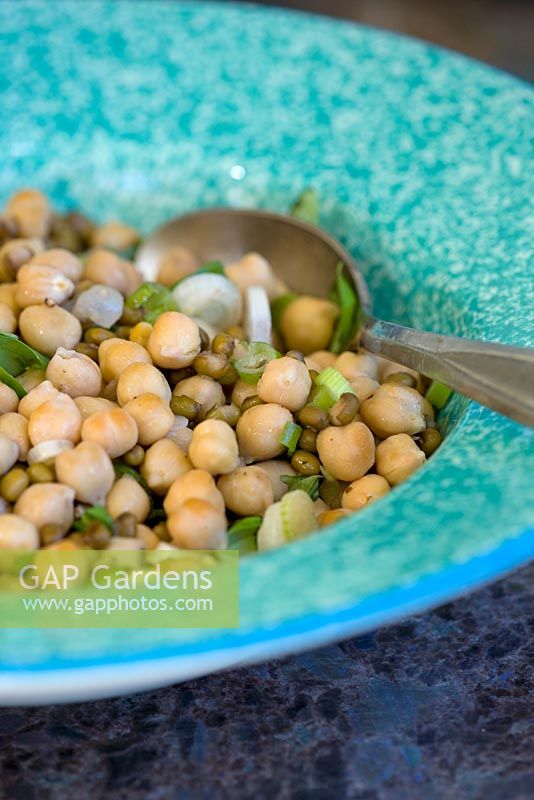 Chickpea salad in a blue bowl