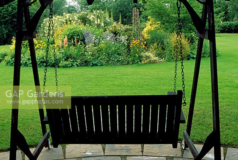 View of yellow bed taken from behind swinging seat - Darkley, North Canon, Herefordshire
