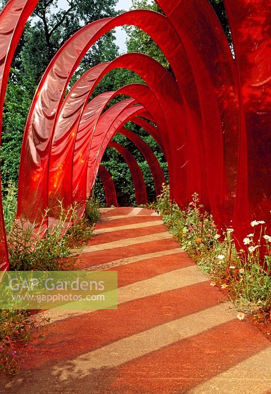 Artificial paradise, showing red shadow from on path - France