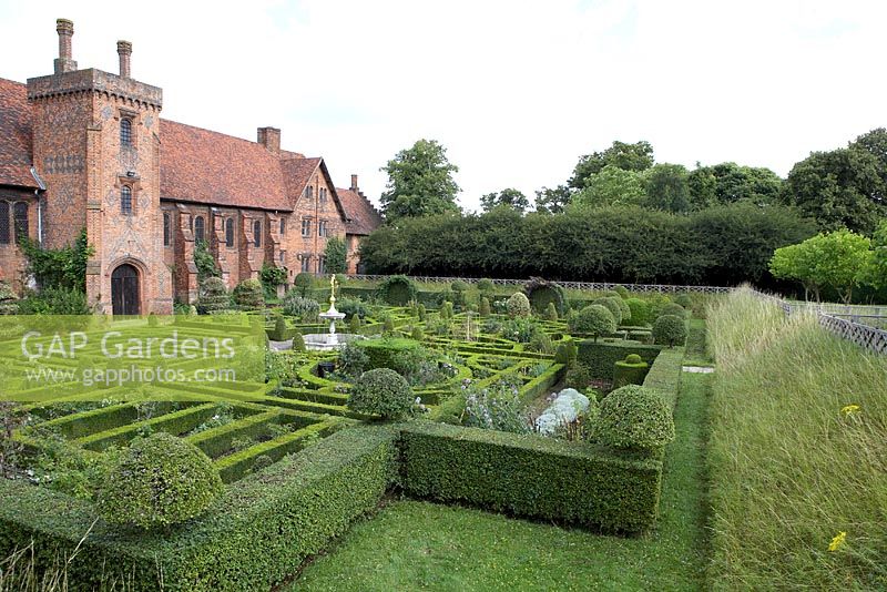 The Tudor Old Palace and Knot Garden at Hatfield House, where Elizabeth 1 spent much of her childhood. Garden contains Buxus - Box, and Crataegus - Hawthorn topiary.