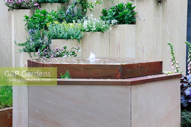 Water feature in the Global Stone Bee Friendly Plants Garden, Silver medal winner at RHS Chelsea Flower Show 2010 
