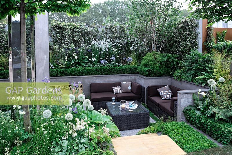 Urban sunken patio area in 'A Joy Forever' Garden, Silver medal winner at RHS Chelsea Flower Show 2010 