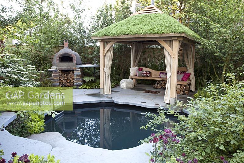 Gazebo with turf roof and plunge pool. The Children's Society garden, Gold medal winner, RHS Chelsea Flower Show 2010 