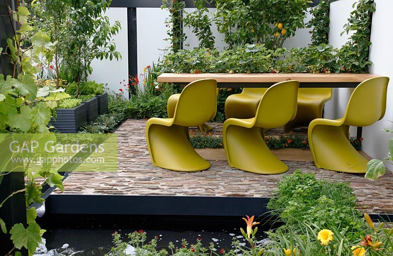 Dining area and patio. 'Food 4 Thought' - Gold Medal Winner - RHS Hampton Court Flower Show 2010 