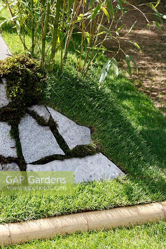 Granite and moss wall. 'Konpira-san' - Gold Medal Winner - RHS Hampton Court Flower Show 2010 
 