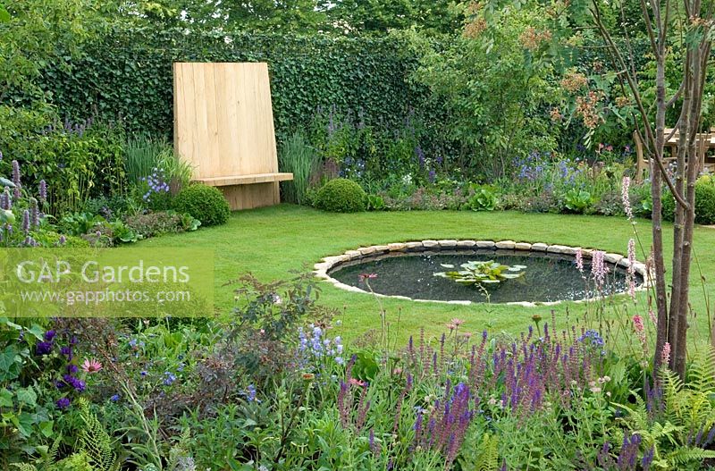 Borders around lawn and circular pond - 'The Combat Stress Therapeutic Garden', Silver medal winner, RHS Hampton Court Flower Show 2010 
 