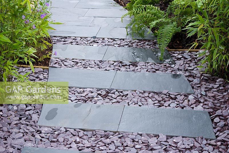Path made of slate slabs and chippings. The 'Making Space - From Darkness to Light' garden - RHS Tatton Flower Show 2010