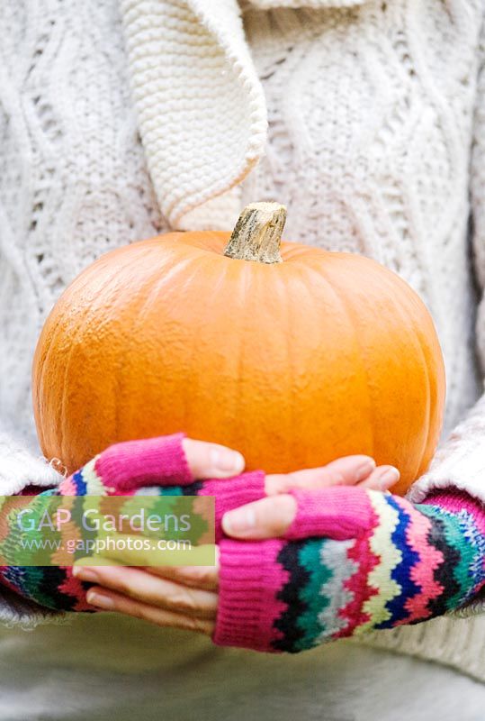 Woman holding Pumpkin