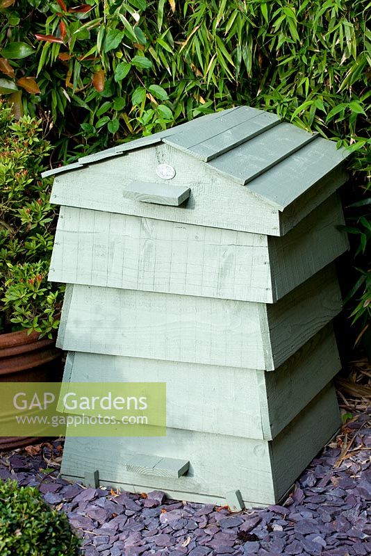 Decorative compost bin, in the shape of a bee hive