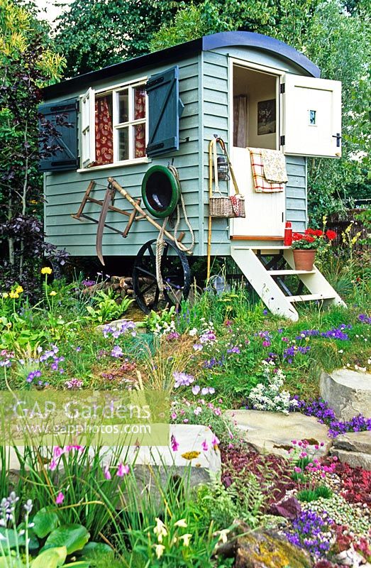 Caravan summerhouse in 'The Shepards Retreat' garden - RHS Hampton Court Flower Show