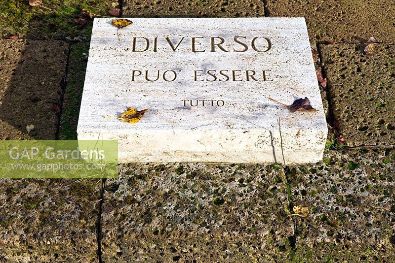 Inscription on stone slab. The Field. Il Bosco Della Ragnaia, San Giovanni D'Asso, Tuscany, Italy, October. 