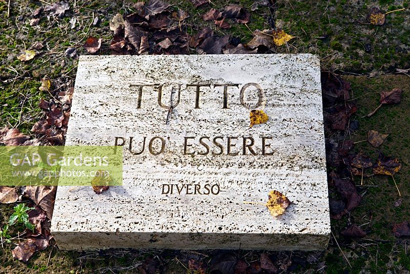 Inscription on stone slab. The Field. Il Bosco Della Ragnaia, San Giovanni D'Asso, Tuscany, Italy, October.  