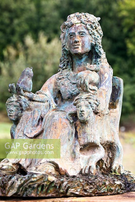 Sculpture of woman and mythological creatures.The Field. Il Bosco Della Ragnaia, San Giovanni D'Asso, Tuscany, Italy, October. 
 