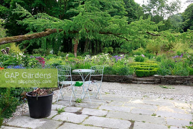 Furniture on terrace - June Blake's garden and nursery Co. Wicklow, Ireland 