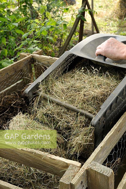 Composting grass cuttings from lawn mower 