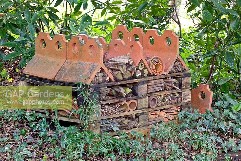 Insect hotel made from terracotta tiles and old broken pots - Pembury House
