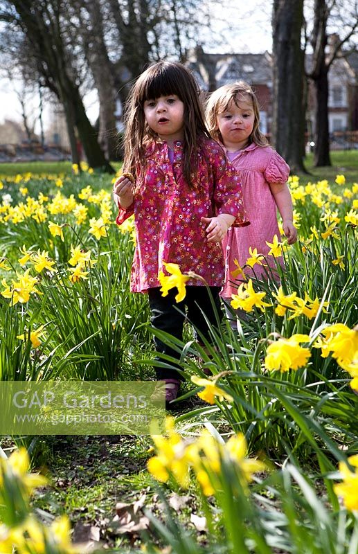 Young girls playing in Spring garden