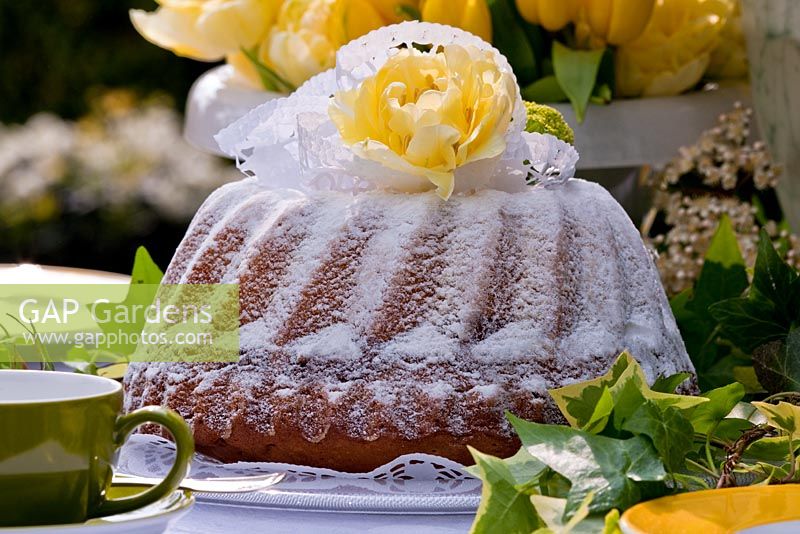 Bundt cake decorated with flowers and Ivy - Wintergarten, Germany
 