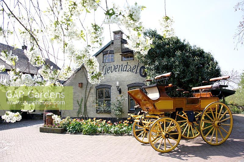 Entrance of the bed and breakfast with Wooden Carriage on Display at Bed and breakfast in Velp, Brabant, Holland