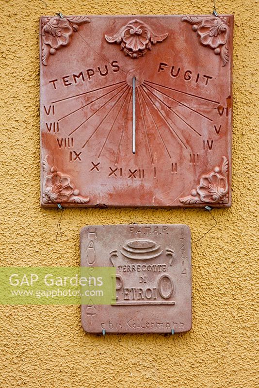 Terracotta sundial and plate