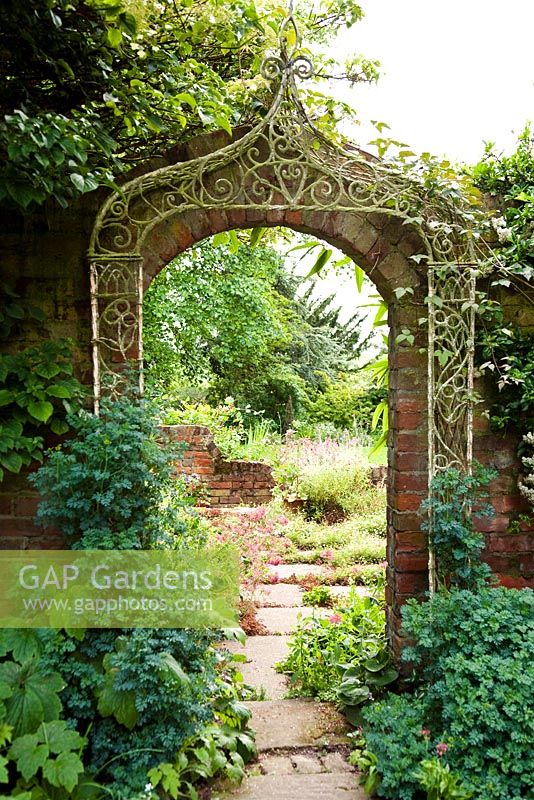 Arch in brick wall - Holbeach Hurn, Lincolnshire, UK, June 
