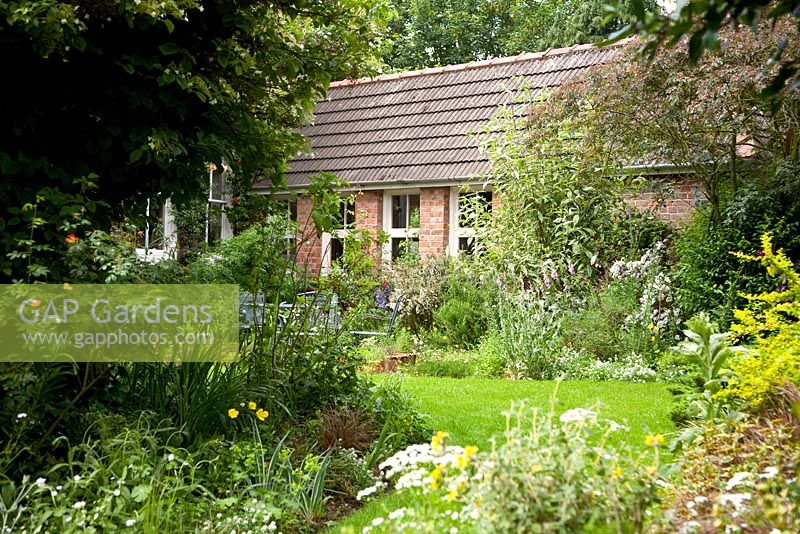 Garden in Summer bloom, Holbeach Hurn, Lincolnshire, UK, June 