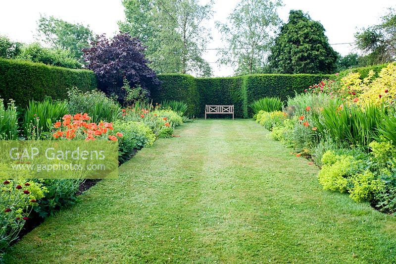 Double hot coloured borders and lawn