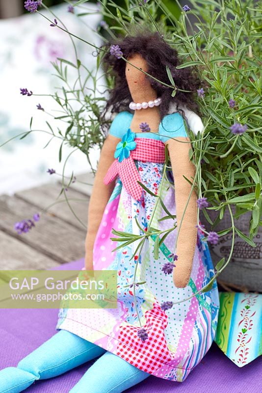Tilda doll by pot of Lavender - Scheper Town Garden 
 