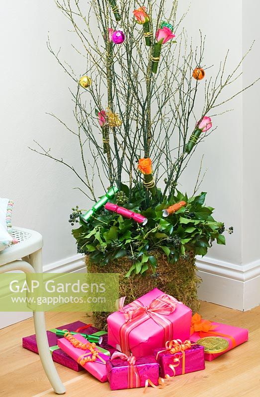 Houseplant decorated with Christmas decorations
