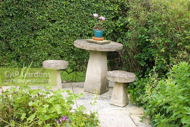 Stone mushroom shaped seats and table 