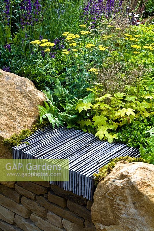 Slate and york stone walls surround 'The Art of Yorkshire garden', sponsored by Welcome to Yorkshire - RHS Chelsea Flower Show 2011.