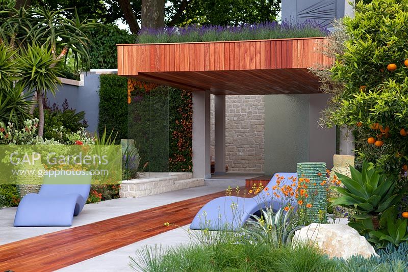 Pavilion with 'living roof' and purple loungers - 'A Monaco Garden' - Gold Medal Winner, RHS Chelsea Flower Show 2011 
