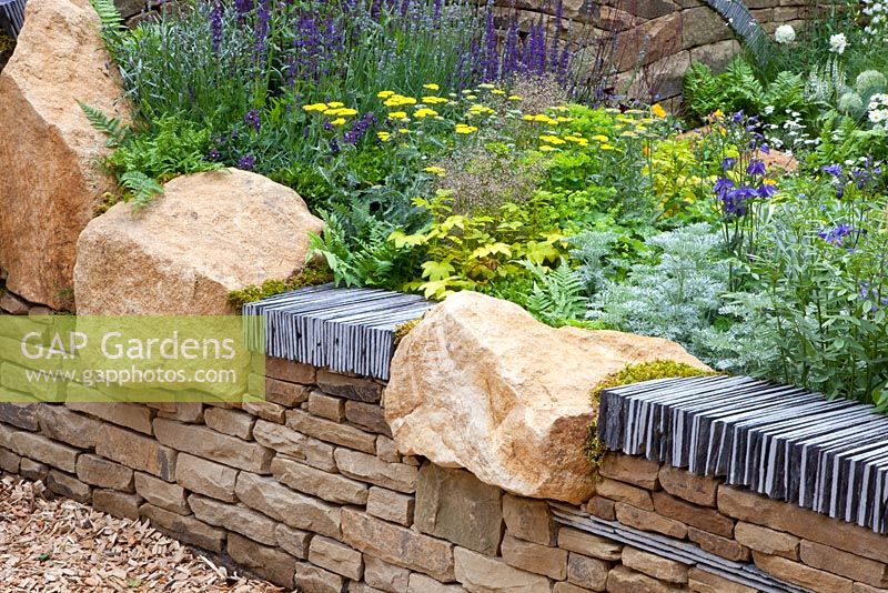 Detail of york stone and slate drystone wall - 'The Art of Yorkshire Garden', sponsored by Welcome to Yorkshire - RHS Chelsea Flower Show 2011