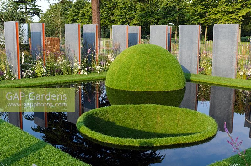 Reflective pool with grass dome - 'The World Vision Garden', Gold Medal Winner, RHS Hampton Court Flower Show 2011