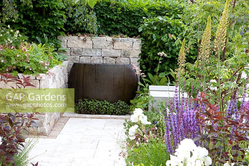 Stone wall and wooden container. 'RNIB Garden', Silver-Gilt Medal Winner. RHS Chelsea Flower Show 2011 