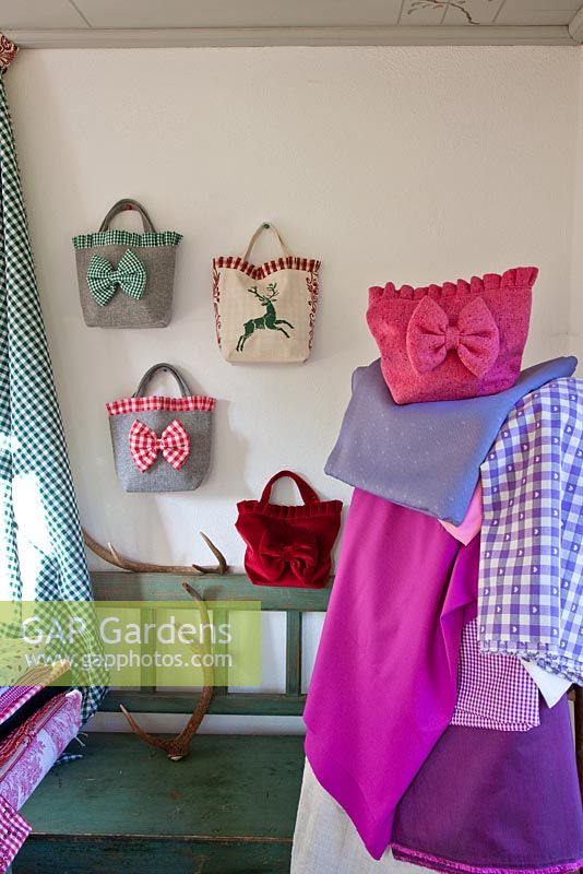 A collection of bags and traditional fabrics for sale - Handbag Garden, Freising, Germany 