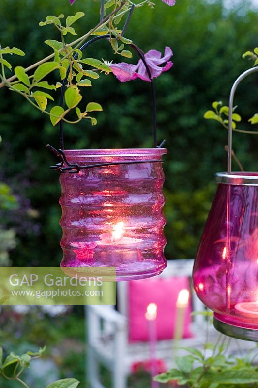 Hanging Pink tealight holders in evening garden