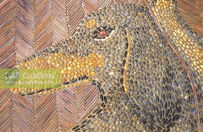 Detail of pebble mosaic at Great Dixter showing head of Christopher Lloyd's Dachshund dog called Canna