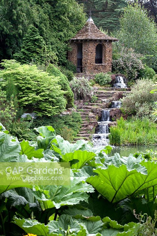Sandringham - steps up to brick summerhouse by waterfall 